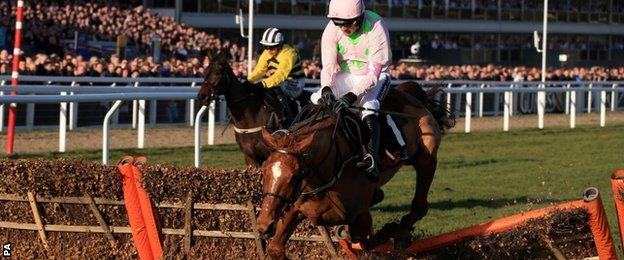 Annie Power and Ruby Walsh (r) falling at the last