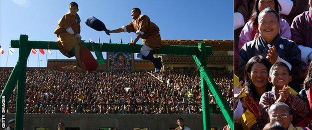 pillow fighters in front of stadium crowd