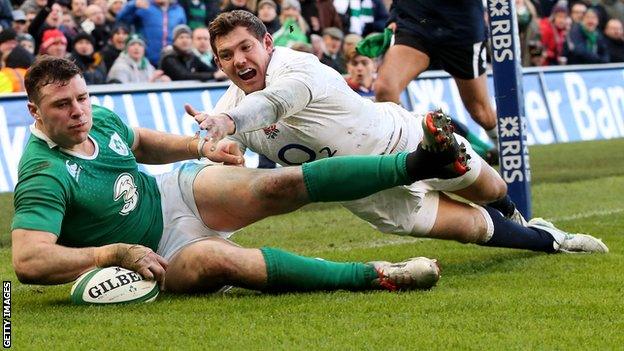 Robbie Henshaw scores Ireland's try in the win over England despite Alex Goode's efforts