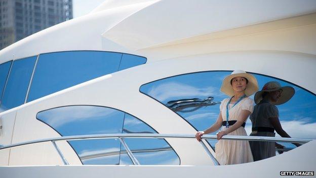 Chinese woman on yacht