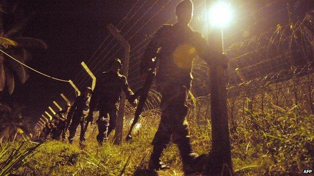 Sri Lankan soldiers patrol, late February 20, 2009 at Katunayake, near the international airport