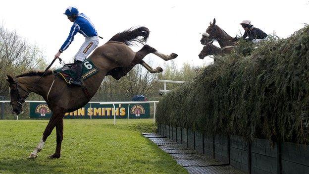 Little Josh lands heavily after jumping over Becher's Brook at Aintree in 2012