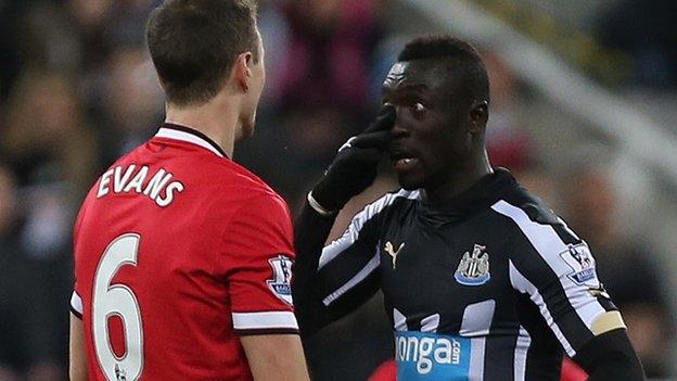 Jonny Evans and Papiss Cisse