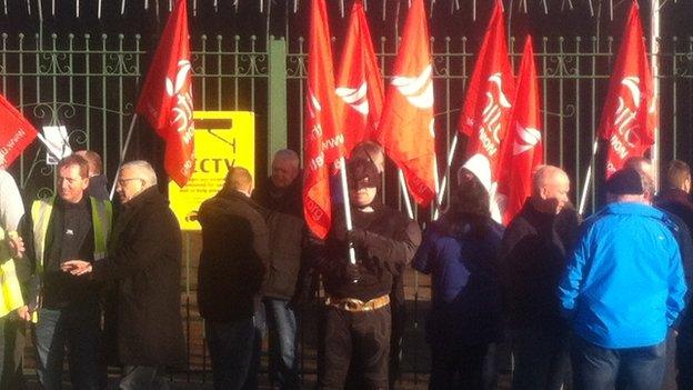 It seems Batman joined the picket line outside the Translink depot on the Falls Road in Belfast