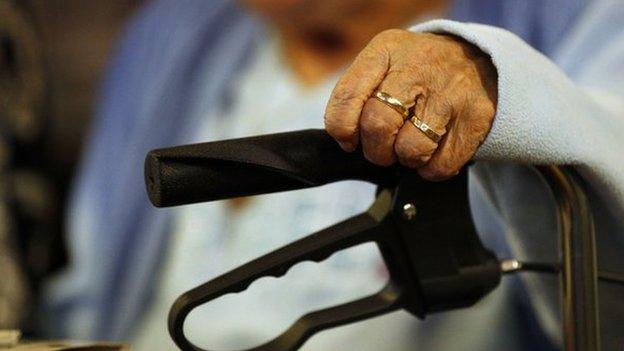 Elderly woman in wheelchair