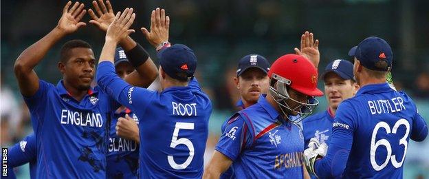 Chris Jordan (left) celebrates a wicket