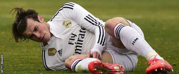 Gareth Bale lies on the floor