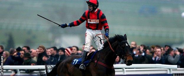 Tom Scudamore on Next Sensation celebrates winning the A.P. McCoy Grand Annual Handicap Chase