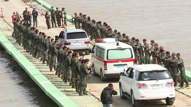 Ambulance taking his body to Erbil