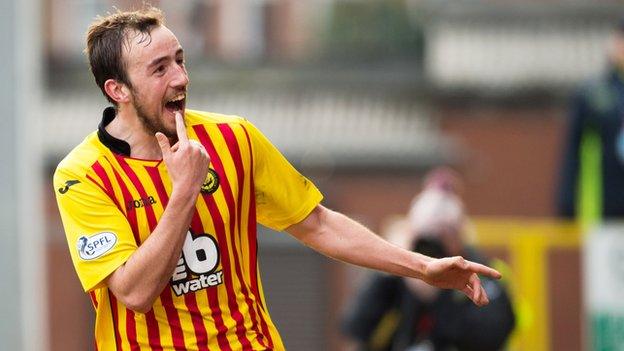 Stuart Bannigan celebrates after adding a third in the second half.