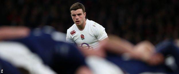 England fly-half George Ford looks on at a ruck