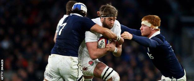 Blair Cowan and Rob Harley tackle England's Geoff Parling