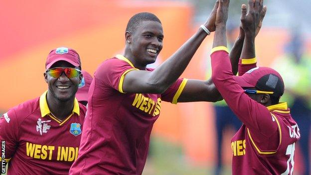 Jason Holder celebrates