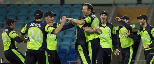 Ireland players celebrate victory over Zimbabwe