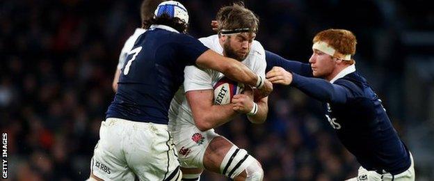 Blair Cowan and Rob Harley tackle England's Geoff Parling