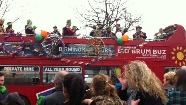 Red bus in the parade