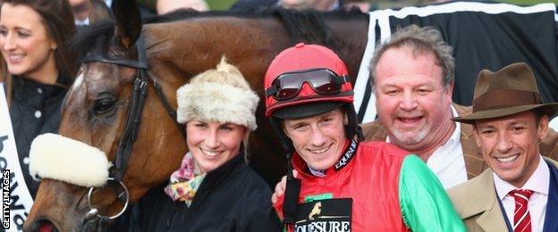 Sam Twiston-Davies celebrates Dodging Bullets win with breeder Frankie Dettori (right)