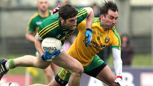 Donegal's Karl Lacey tries to keep pace with Kerry's Killian Young