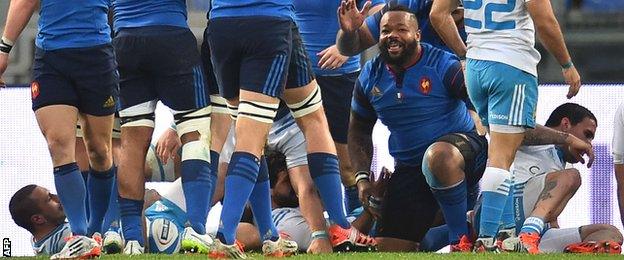 Mathieu Bastareaud smiles after scoring his try for France against Italy