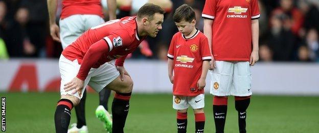 Wayne Rooney with Kai Rooney