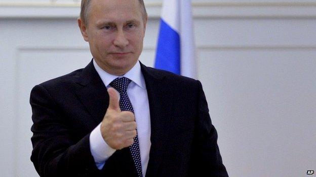 Russian President Vladimir Putin gives thumbs up in Moscow, Russia - 23 December 2014