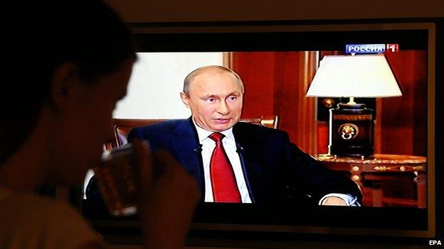 Person watches documentary "Crimea. Homeward bound" with Vladimir Putin