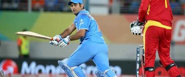 MS Dhoni sweeps a ball for four against Zimbabwe