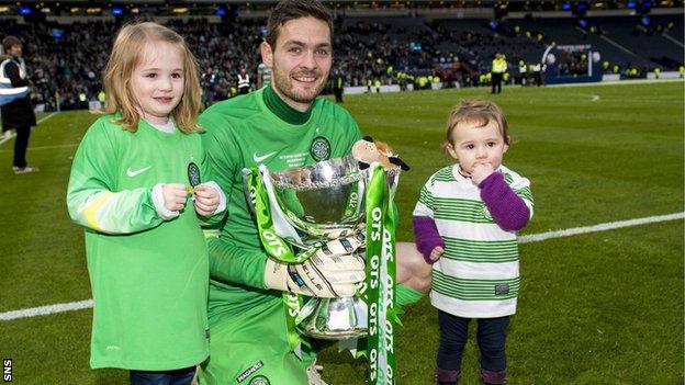 Celtic's Craig Gordon celebrates at Hampden with his children