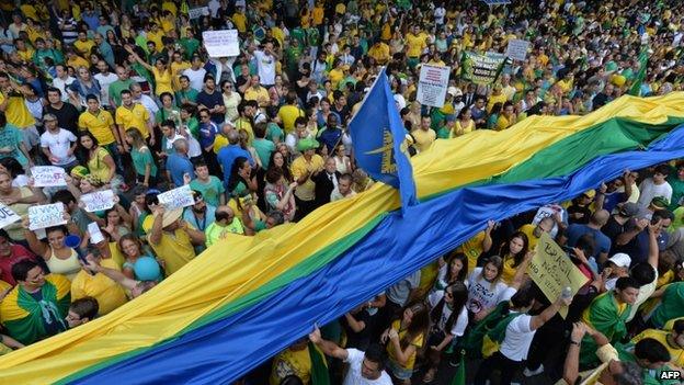 Demonstrators rally to protest against the government of president Dilma Rousseff in Paulista Avenue in Sao Paulo