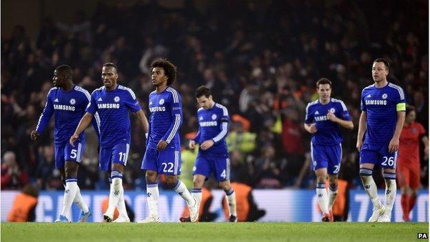 Chelsea's Didier Drogba, Willian and John Terry appear dejected after they concede a second goal during the UEFA Champions League Round of Sixteen match at Stamford Bridge, London