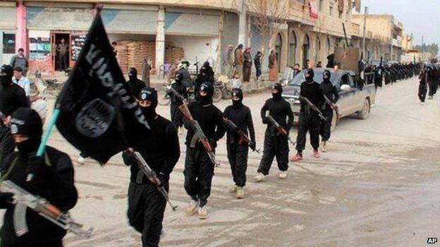 Islamic State militants in Raqqa. File photo