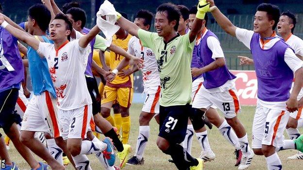 Bhutan players celebrate during their first leg victory against Sri Lanka