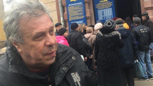 Yuri Rabinovich outside administrative building