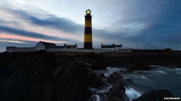 The lighthouse at St John's Point at dusk