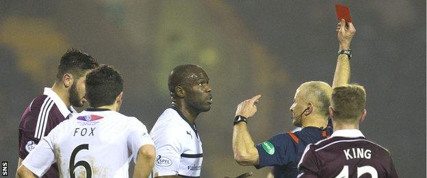 Raith Rovers forward Christian Nade is sent off against Hearts