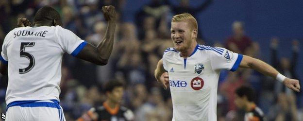 Calum Mallace (right) celebrates with Montreal Impact