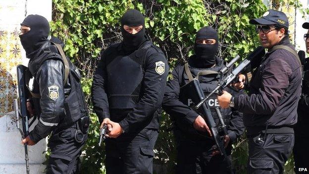 Members of the Tunisian security services take up positions after gunmen reportedly took hostages near the country's parliament, outside the National Bardo Museum, Tunis, Tunisia, 18 March 2015