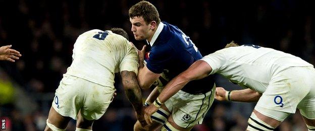 Adam Ashe in action against England