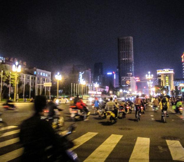 Busy road with a lot of mopeds