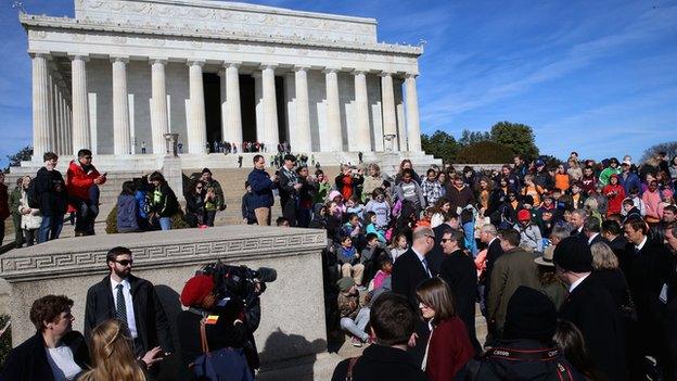 Crowds gather as the couple visited the memorials