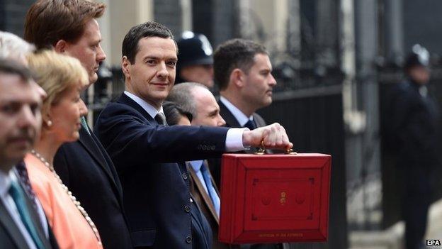 Chancellor George Osborne with his Treasury team outside 11 Downing Street