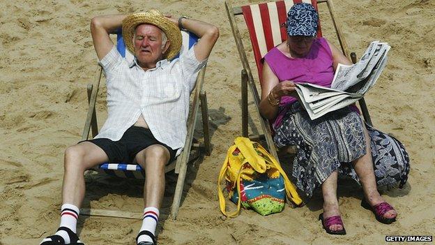 Pensioners on deck chairs