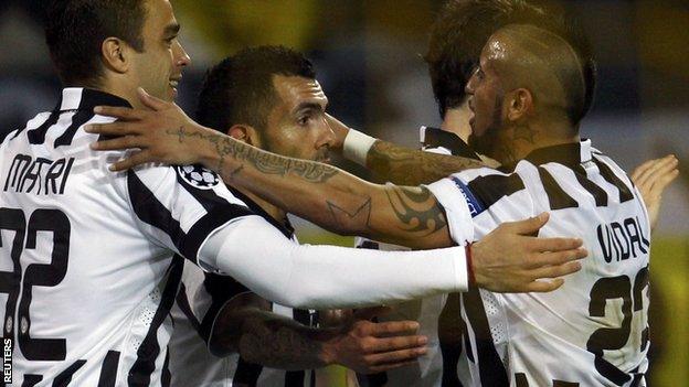 Carlos Tevez celebrates