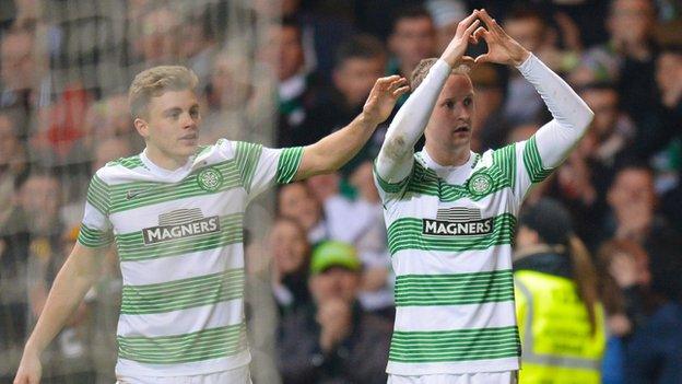 James Forrest (left) helps Leigh Griffiths celebrate his goal.