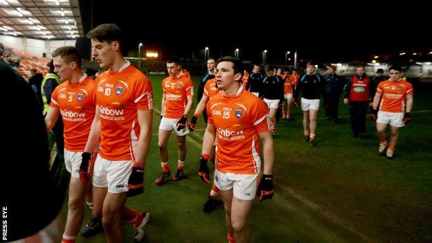 Armagh players walk off after the lights went out at the Athletic Grounds