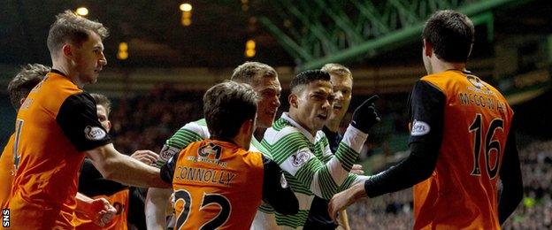 Celtic players react angrily to a Ryan McGowan challenge on Liam Henderson, which saw the defender sent off.