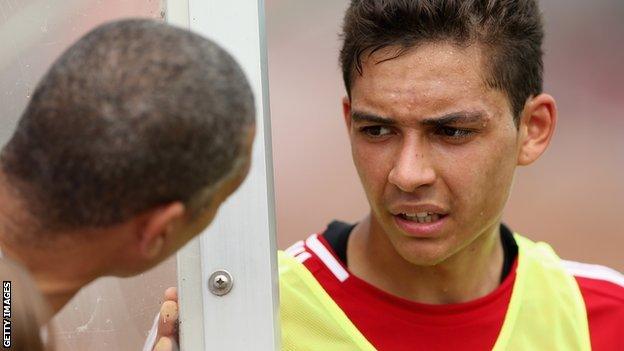 Des Walker talking to son Tyler (right)