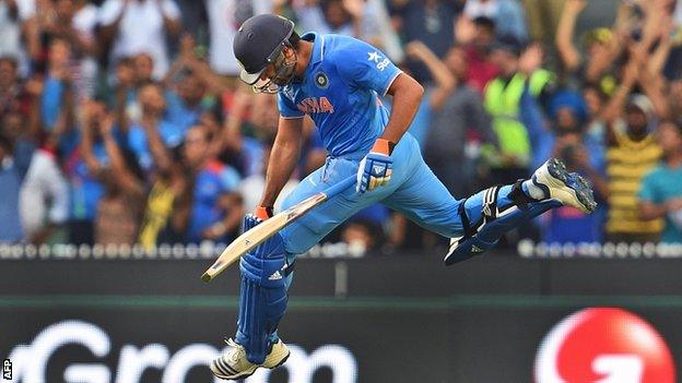 Rohit Sharma celebrates scoring his century