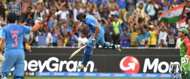 Rohit Sharma celebrates scoring his century