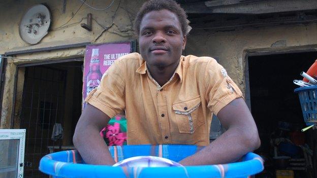 Bar tender Paul Bini in Kano